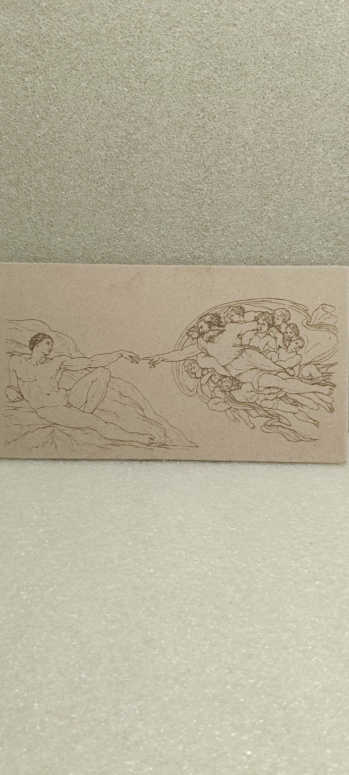 Laser engraved artwork on wood